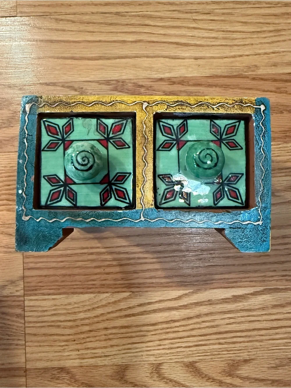 A hand-painted wooden & ceramic mini storage chest or trinket box
